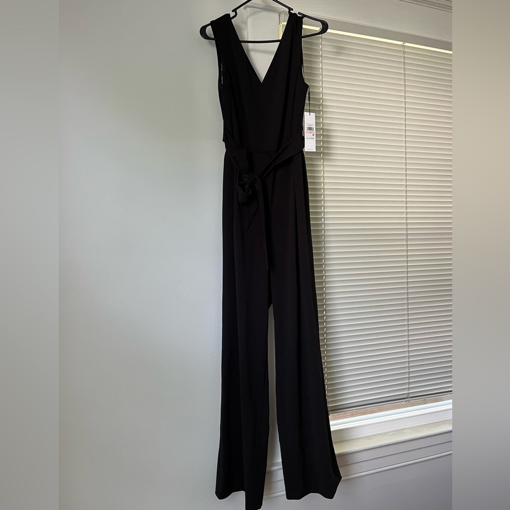 **sold elsewhere** Calvin Klein size 10 black cut out Jumpsuit with tie waist